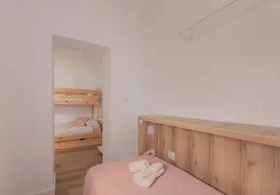 Cama o camas de una habitación en Wood 6