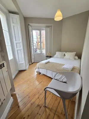 Cama o camas de una habitación en La Casita de Loli