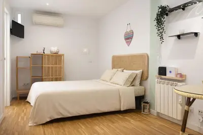 Cama o camas de una habitación en Estudio Atocha