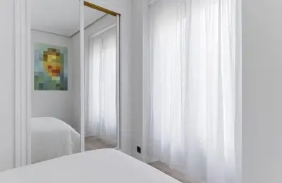Cama o camas de una habitación en Luz y diseño en Malasaña, Piso céntrico y nuevo