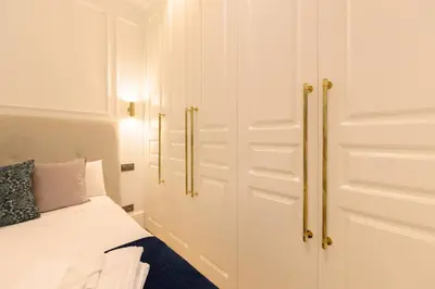 Cama o camas de una habitación en Exclusive Luxury Apartment in the Salamanca Neighborhood Temporal GPA240