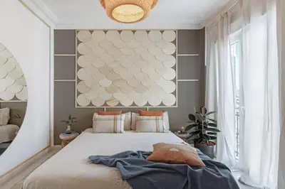 Cama o camas de una habitación en Derawan - 2 bedrooms and terrace in Chamberí