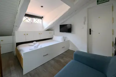 Una televisión o centro de entretenimiento en GuestReady - Quiet Retreat in Madrid
