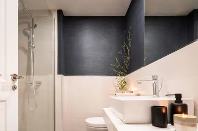 Un baño de Saru - 1 bedroom and gym in Almagro