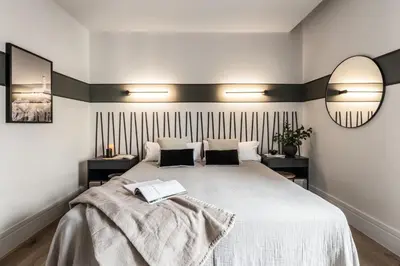 Cama o camas de una habitación en Lusciano - 2 bedrooms, pool and gym in Almagro