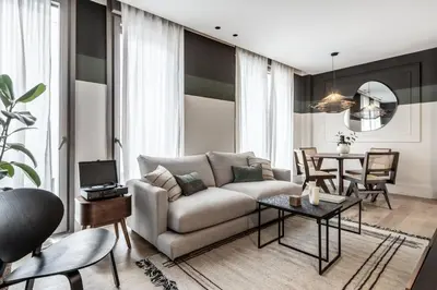 Zona de estar de Lusciano - 2 bedrooms, pool and gym in Almagro