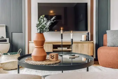 Una televisión o centro de entretenimiento en Rumi - 2 bedrooms in Goya