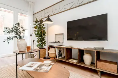 Una televisión o centro de entretenimiento en Acari - 1 bedroom and pool in Lista
