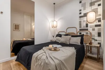 Cama o camas de una habitación en Betawi - 3 bedroom in Chamberí