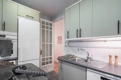 Una cocina o zona de cocina en Betawi - 3 bedroom in Chamberí