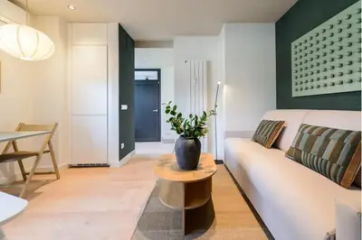 Zona de estar de Victoria Chic Suites 04