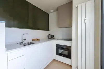 Una cocina o zona de cocina en Victoria Chic Suites 04