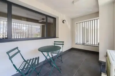 Zona de estar de Victoria Chic Suites 04