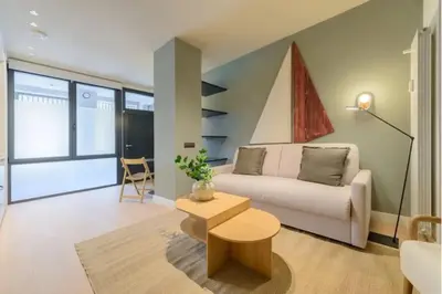 Zona de estar de Victoria Chic Suites 05