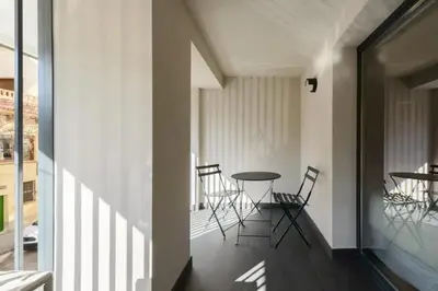 Zona de estar de Victoria Chic Suites 05