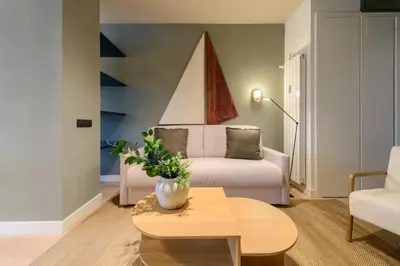 Zona de estar de Victoria Chic Suites 05