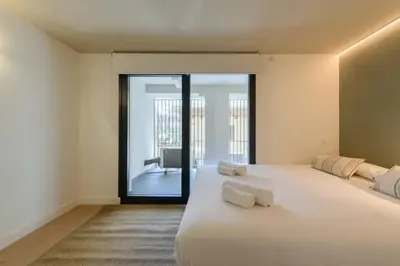 Cama o camas de una habitación en Victoria Chic Suites 05