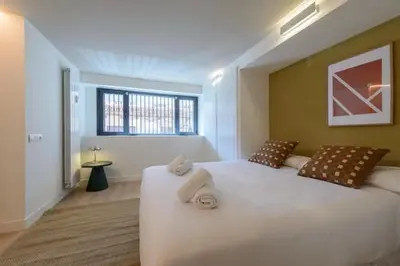 Cama o camas de una habitación en Victoria Chic Suites 06