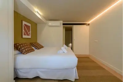 Cama o camas de una habitación en Victoria Chic Suites 06