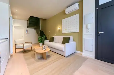 Zona de estar de Victoria Chic Suites 06