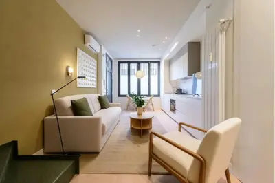 Zona de estar de Victoria Chic Suites 06