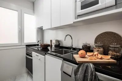 Una cocina o zona de cocina en Logo - 2 bedrooms in Salamanca