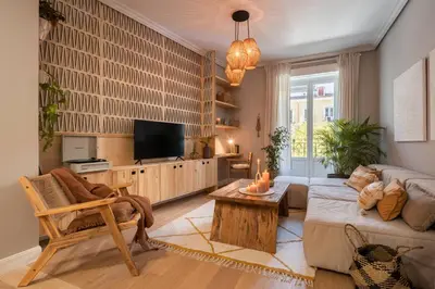 Una televisión o centro de entretenimiento en Pantai - 2 bedroom in Almagro