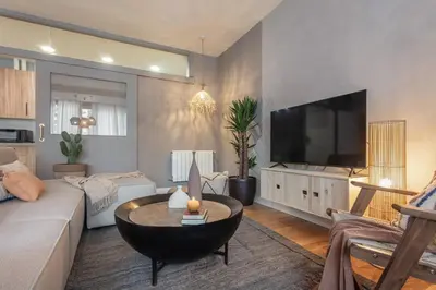 Una televisión o centro de entretenimiento en Rachid - 2 bedrooms in Azca