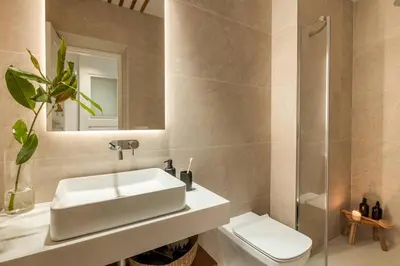 Un baño de Papua - 2 bedrooms and gym in Almagro