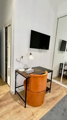 Una televisión o centro de entretenimiento en Habitación Plaza Zerolo C