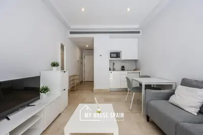 Una cocina o zona de cocina en MyHouseSpain - Luminoso estudio cerca del Retiro