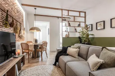 Una televisión o centro de entretenimiento en Alcazar - 1 bedroom and terrace in Almagro