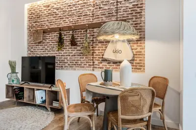 Una televisión o centro de entretenimiento en Alcazar - 1 bedroom and terrace in Almagro