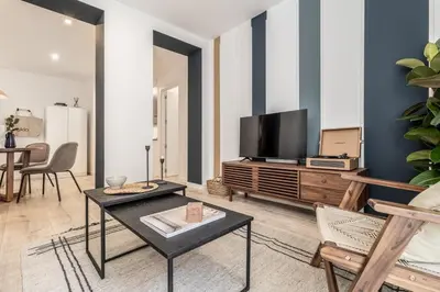 Una televisión o centro de entretenimiento en Favola - 1 bedroom in Arapiles