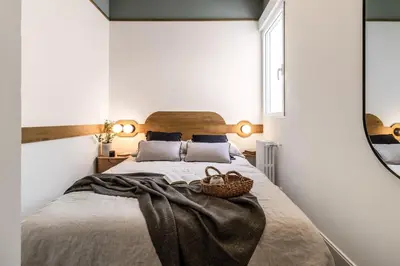 Cama o camas de una habitación en Lustar - 2 bedrooms and terrace in Chueca