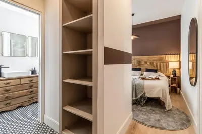 Cama o camas de una habitación en Lustar - 2 bedrooms and terrace in Chueca