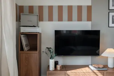 Una televisión o centro de entretenimiento en Lumi - 2 bedrooms in Malasaña-Universidad