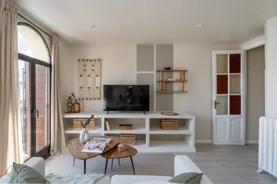 Una televisión o centro de entretenimiento en Giona - 2 bedrooms in Argüelles