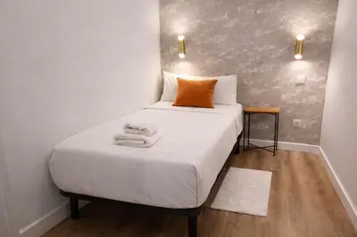 Cama o camas de una habitación en Light New Apartment