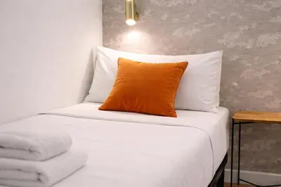 Cama o camas de una habitación en Light New Apartment