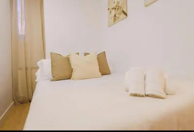 Cama o camas de una habitación en Apartament Distrito del arte Art District