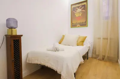 Cama o camas de una habitación en Apartament Distrito del arte Art District