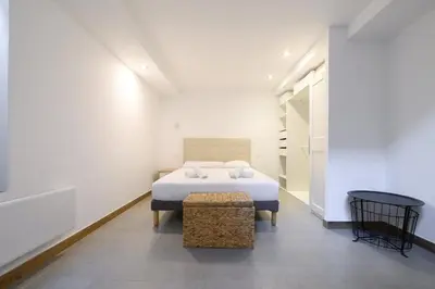 Cama o camas de una habitación en GuestReady - Your Urban Retreat in Madrid