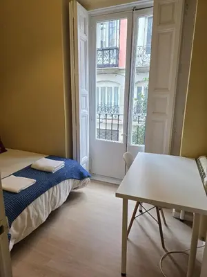 Cama o camas de una habitación en La Casita de Christian
