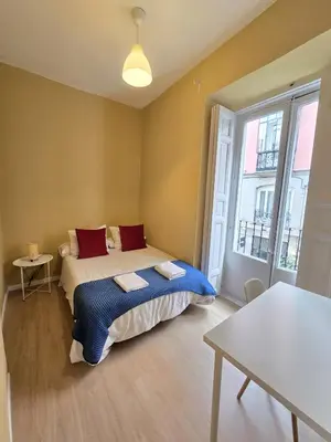Cama o camas de una habitación en La Casita de Christian