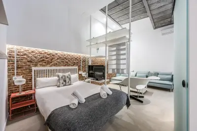 Cama o camas de una habitación en Stylish Flat Near Plaza Mayor & La Latina