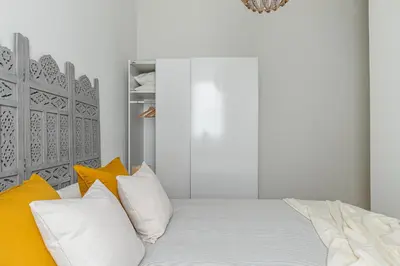 Cama o camas de una habitación en Chamberi City Center Apartment