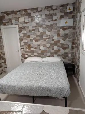 Cama o camas de una habitación en Estudio Madrid L9C