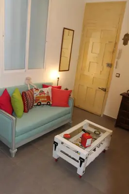 Zona de estar de Encantador Apartamento en el Corazón de Madrid