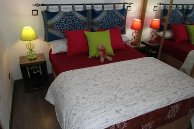Cama o camas de una habitación en Encantador Apartamento en el Corazón de Madrid